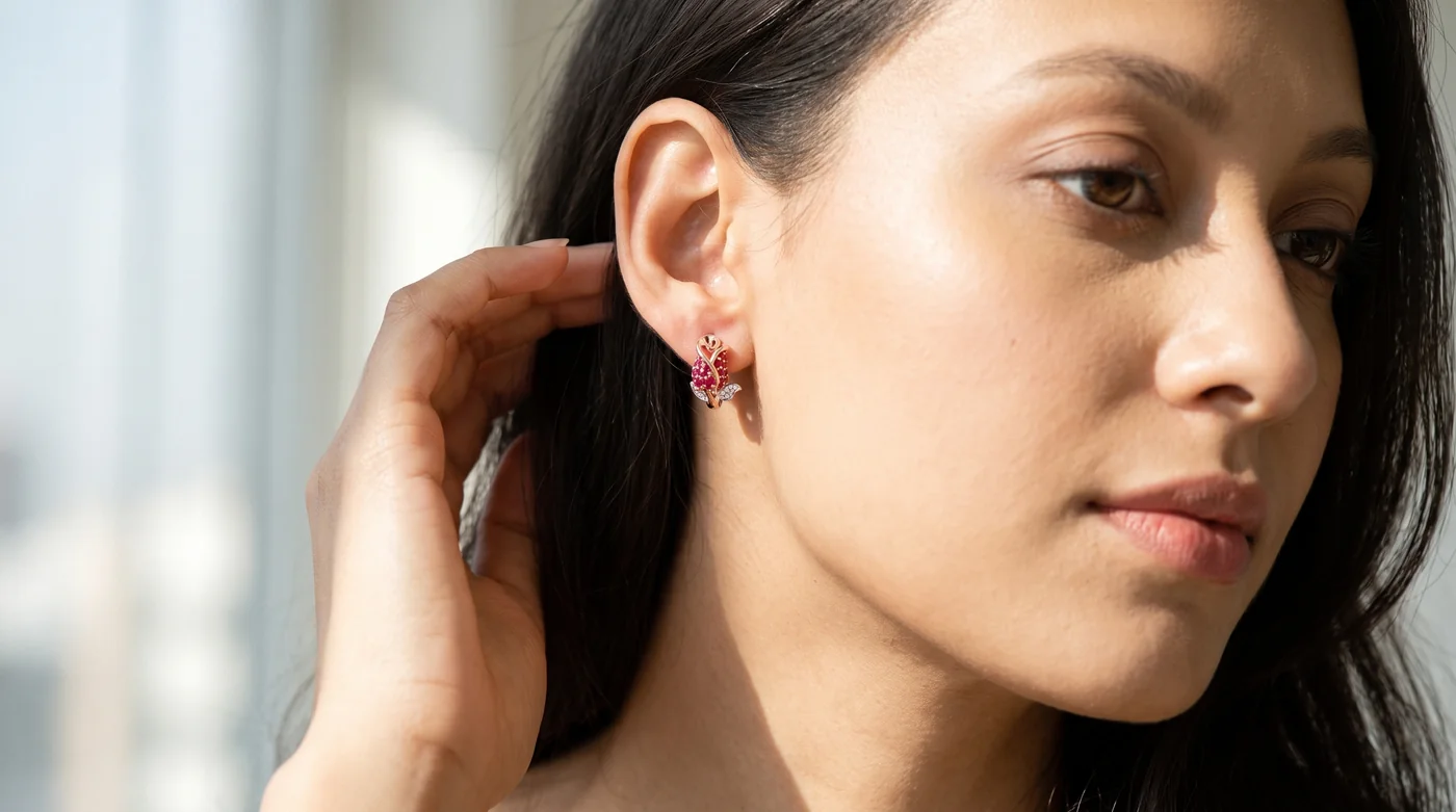 Daily wear earrings buying guide 2026 hero: fair-skinned Indian woman wearing The Aleena Huggie Earrings in 18k solid gold